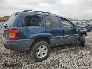 2002 Jeep Grand Cherokee Laredo with VIN 1J4GW48N02C165868, listed as a Copart auction lot 82228494 with 0 mi miles and Salvage Title. Bid and sale history available at carsss.com. Image 3.