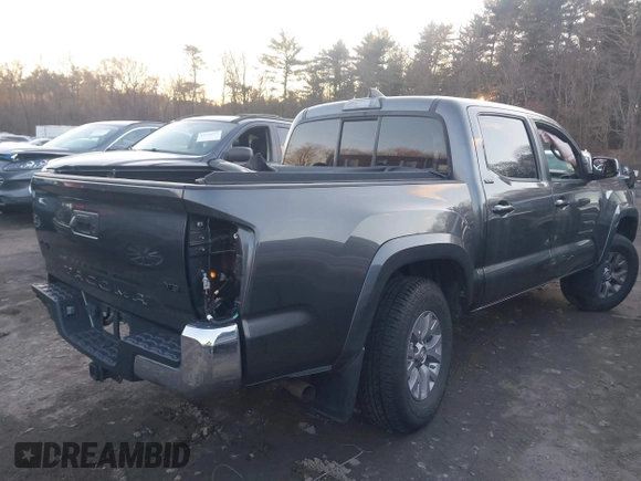 2017 Toyota Tacoma SR5 with VIN 3TMCZ5AN4HM104459, listed as a IAAI auction lot 41207997 with 80,103 mi miles and . Bid and sale history available at DreamBid. Image 4.