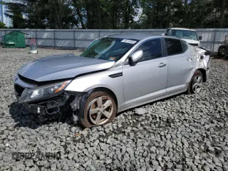 2014 Kia Optima LX z VIN 5XXGM4A79EG311308, wystawiony jako Copart lot #58212405 z przebiegiem 147 006 mil mil oraz Szkoda całkowita • Salvage title. Historia ofert i sprzedaży dostępna na DreamBid. Obrazek 1.