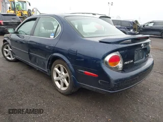 2002 Nissan Maxima GXE with VIN JN1DA31D72T410204, listed as a IAAI auction lot 42515430 with 91,406 mi miles and . Bid and sale history available at DreamBid. Image 3.