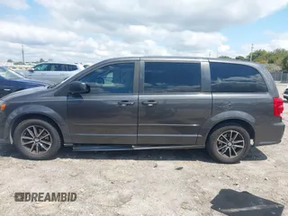 2015 Dodge Grand Caravan American Value with VIN 2C4RDGBGXFR682995, listed as a IAAI auction lot 41994708 with 142,725 mi miles and . Bid and sale history available at DreamBid. Image 14.