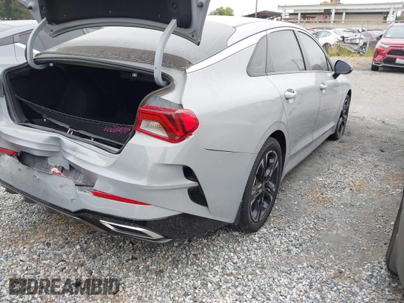 2023 Kia K5 GT-Line z VIN 5XXG64J25PG181772, wystawiony jako IAAI lot #42283124 z przebiegiem 40 857 mil mil oraz . Historia ofert i sprzedaży dostępna na DreamBid. Obrazek 4.