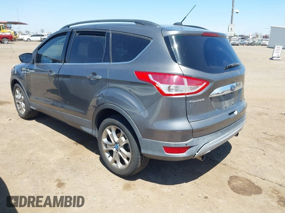 2013 Ford Escape SEL with VIN 1FMCU9H92DUB31689, listed as a IAAI auction lot 42022387 with 74,343 mi miles. Bid and sale history available at carsss.com. Image 3.