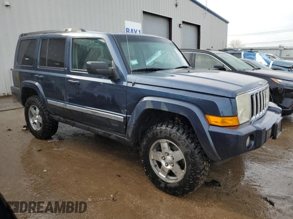 2010 Jeep Commander Sport with VIN 1J4RG4GK5AC119433, listed as a Copart auction lot 87657265 with 212,973 mi miles and Salvage title. Bid and sale history available at DreamBid. Image 4.