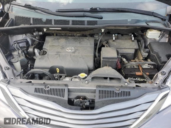 2013 Toyota Sienna XLE AAS z VIN 5TDYK3DCXDS297896, wystawiony jako Copart lot #57778165 z przebiegiem 239 360 mil mil oraz Szkoda całkowita • Salvage title. Historia ofert i sprzedaży dostępna na DreamBid. Obrazek 12.
