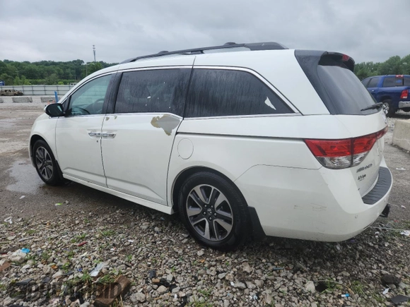 2014 Honda Odyssey Touring with VIN 5FNRL5H95EB083772, listed as a Copart auction lot 56713525 with 215,833 mi miles and Salvage title. Bid and sale history available at DreamBid. Image 2.