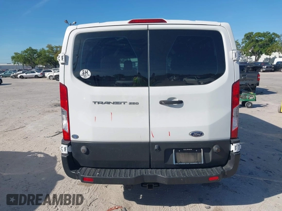 2019 Ford Transit z VIN 1FTYR2ZM1KKB25574, wystawiony jako IAAI lot #41891247 z przebiegiem 142 627 mil mil oraz . Historia ofert i sprzedaży dostępna na DreamBid. Obrazek 16.