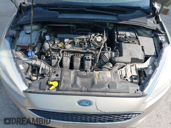 2016 Ford Focus SE z VIN 1FADP3F29GL361006, wystawiony jako IAAI lot #42387418 z przebiegiem 132 806 mil mil oraz . Historia ofert i sprzedaży dostępna na DreamBid. Obrazek 10.