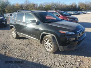 2015 Jeep Cherokee Sport with VIN 1C4PJLAB8FW663173, listed as a Copart auction lot 81185614 with 126,738 mi miles and Salvage title. Bid and sale history available at DreamBid. Image 4.