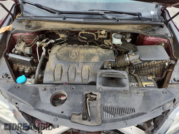 2017 Acura RDX Advance with VIN 5J8TB3H78HL002925, listed as a Copart auction lot 59777585 with 104,685 mi miles and Salvage title. Bid and sale history available at DreamBid. Image 11.