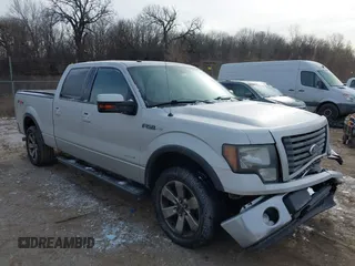 2011 Ford F-150 XLT with VIN 1FTFW1ET9BFB82704, listed as a IAAI auction lot 41238052 with 175,590 mi miles. Bid and sale history available at carsss.com. Image 1.