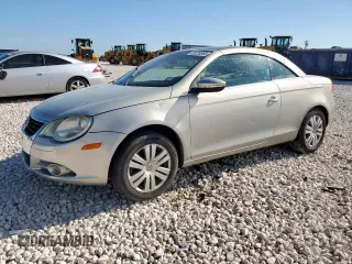 2009 Volkswagen Eos Komfort с VIN WVWAA71F99V016050, выставлен на аукционе Copart как лот 58229565 с пробегом 105 584 миль миль и Списание • Salvage title. История ставок и продаж доступна на DreamBid. Изображение 1.