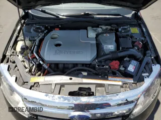 2010 Ford Fusion Hybrid z VIN 3FADP0L33AR185719, wystawiony jako Copart lot #59821115 z przebiegiem 154 019 mil mil oraz Czysty tytuł • Clean title. Historia ofert i sprzedaży dostępna na DreamBid. Obrazek 11.