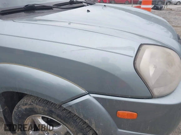 2007 Hyundai Tucson SE with VIN KM8JN12D27U606152, listed as a IAAI auction lot 41465051 with 141,478 mi miles. Bid and sale history available at carsss.com. Image 13.