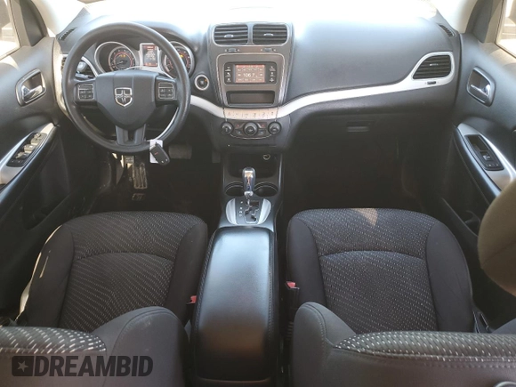 2015 Dodge Journey American Value with VIN 3C4PDCAB2FT538201, listed as a Copart auction lot 47058615 with 135,280 mi miles and Salvage Title. Bid and sale history available at DreamBid. Image 8.