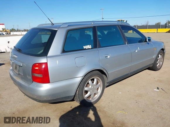 1998 Audi A4 with VIN WAUGD28D5WA235015, listed as a IAAI auction lot 41744703 with 233,432 mi miles. Bid and sale history available at carsss.com. Image 4.