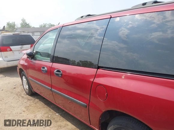 2003 Ford Windstar LX with VIN 2FMDA51423BB30227, listed as a IAAI auction lot 42429081 with 37,113 mi miles and . Bid and sale history available at DreamBid. Image 14.