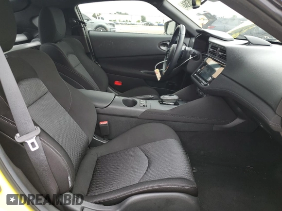2023 Nissan Z Sport с VIN JN1BZ4AH0PM310987, выставлен на аукционе Copart как лот 74926264 с пробегом 10 474 миль миль и Списание • Salvage title. История ставок и продаж доступна на DreamBid. Изображение 10.