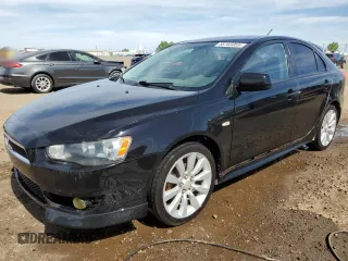 2009 Mitsubishi Lancer z VIN JA3AX88W99U613116, wystawiony jako Copart lot #58765855 z przebiegiem 256 289 mil mil oraz Czysty tytuł • Clean title. Historia ofert i sprzedaży dostępna na DreamBid. Obrazek 1.