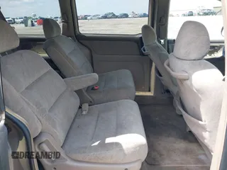 2000 Honda Odyssey EX with VIN 2HKRL1868YH513587, listed as a IAAI auction lot 42092115 with 302,555 mi miles and . Bid and sale history available at DreamBid. Image 8.