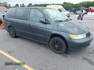 2003 Honda Odyssey EX-L with VIN 5FNRL18963B059910, listed as a IAAI auction lot 42415037 with 267,600 mi miles and . Bid and sale history available at DreamBid. Image 1.