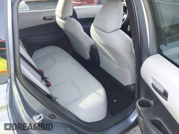 2023 Toyota Corolla Cross L with VIN 7MUAAAAG4PV044969, listed as a IAAI auction lot 42388727 with 26,071 mi miles and . Bid and sale history available at DreamBid. Image 8.