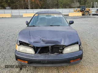 1995 Honda Accord LX with VIN 1HGCD5630SA032204, listed as a Copart auction lot 79454934 with 52,291 mi miles and Salvage Title. Bid and sale history available at DreamBid. Image 5.