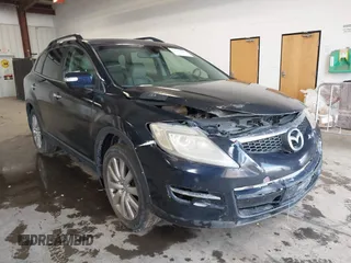 2008 Mazda CX-9 Grand Touring z VIN JM3TB38AX80150030, wystawiony jako IAAI lot #42242206 z przebiegiem 172 776 mil mil oraz . Historia ofert i sprzedaży dostępna na DreamBid. Obrazek 1.