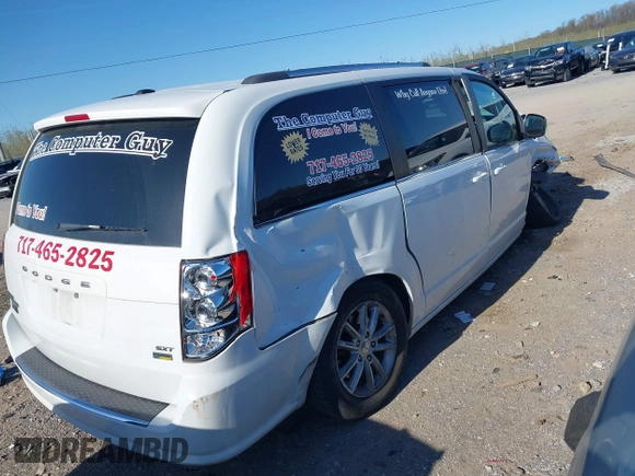 2019 Dodge Grand Caravan SXT with VIN 2C4RDGCG1KR545775, listed as a IAAI auction lot 42061287 with 131,603 mi miles and . Bid and sale history available at DreamBid. Image 4.