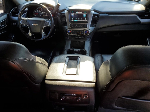 2015 Chevrolet Suburban LT with VIN 1GNSKJKC2FR274506, listed as a Copart auction lot 87881695 with 196,506 mi miles and Salvage Title. Bid and sale history available at DreamBid. Image 8.