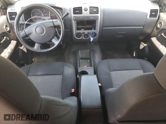 2007 GMC Canyon SLE2 z VIN 1GTDT13E678189156, wystawiony jako Copart lot #52403215 z przebiegiem 144 312 mil mil oraz Czysty tytuł • Clean title. Historia ofert i sprzedaży dostępna na DreamBid. Obrazek 8.