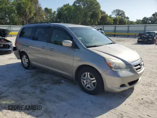 2007 Honda Odyssey EX-L with VIN 5FNRL387X7B043046, listed as a Copart auction lot 52604635 with 228,961 mi miles and Salvage Title. Bid and sale history available at carsss.com. Image 4.