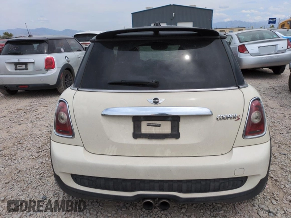 2009 MINI Hardtop S with VIN WMWMF73569TW87347, listed as a Copart auction lot 59445035 with Not provided miles and Salvage title. Bid and sale history available at DreamBid. Image 6.