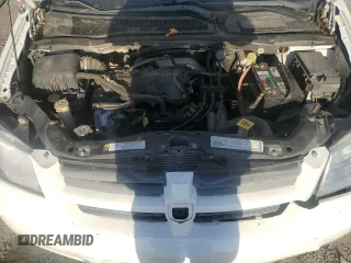 2009 Dodge Grand Caravan Cargo with VIN 2D4HN11E09R685028, listed as a Copart auction lot 77095054 with 240,140 mi miles and Salvage Title. Bid and sale history available at carsss.com. Image 12.