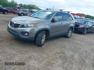 2011 Kia Sorento LX with VIN 5XYKTCA14BG056447, listed as a IAAI auction lot 42212972 with 207,258 mi miles. Bid and sale history available at carsss.com. Image 2.