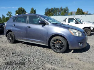 2009 Pontiac Vibe with VIN 5Y2SM67089Z402282, listed as a Copart auction lot 73973264 with 116,743 mi miles and Clean Title. Bid and sale history available at carsss.com. Image 4.