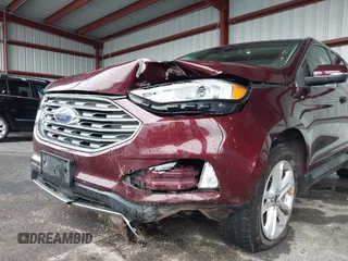2019 Ford Edge SEL z VIN 2FMPK4J96KBB18838, wystawiony jako IAAI lot #42237001 z przebiegiem 72 875 mil mil oraz . Historia ofert i sprzedaży dostępna na DreamBid. Obrazek 6.