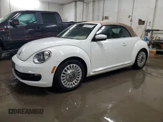 2013 Volkswagen Beetle 2.5L w/Sound/Nav with VIN 3VW5P7AT7DM811619, listed as a Copart auction lot 60331015 with 115,532 mi miles and Salvage title. Bid and sale history available at DreamBid. Image 1.