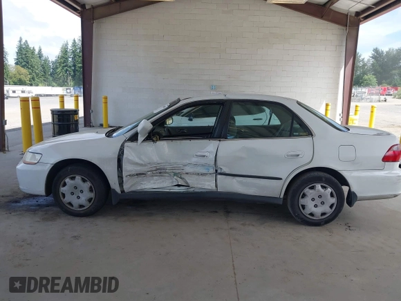 1998 Honda Accord LX with VIN 1HGCG5640WA004358, listed as a IAAI auction lot 42643808 with Not provided miles and . Bid and sale history available at DreamBid. Image 14.
