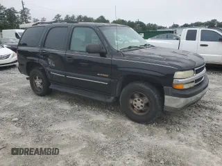 2001 Chevrolet Tahoe LS z VIN 1GNEC13T51J268893, wystawiony jako Copart lot #58527885 z przebiegiem 285 422 mil mil oraz Szkoda całkowita • Salvage title. Historia ofert i sprzedaży dostępna na DreamBid. Obrazek 4.