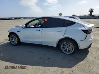 2021 Tesla Model Y Standard Range z VIN 5YJYGDED9MF110473, wystawiony jako Copart lot #53850085 z przebiegiem 46 242 mil mil oraz Szkoda całkowita • Salvage title. Historia ofert i sprzedaży dostępna na DreamBid. Obrazek 2.