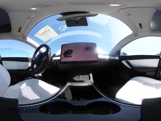 2022 Tesla Model Y Long Range z VIN 7SAYGDEE7NF418223, wystawiony jako IAAI lot #42046651 z przebiegiem 18 724 mil mil oraz . Historia ofert i sprzedaży dostępna na DreamBid. Obrazek 21.