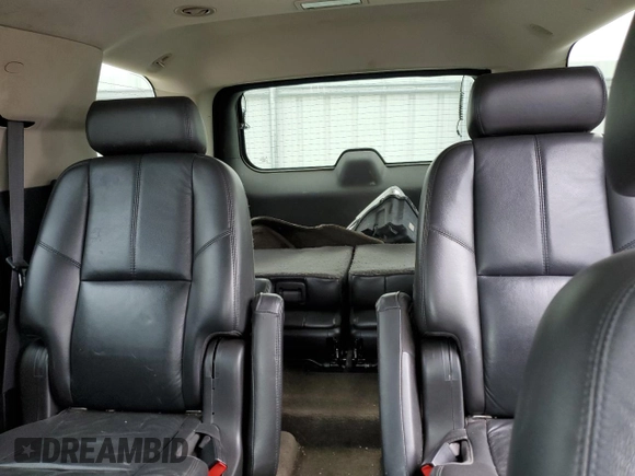 2009 GMC Yukon SLT 4SB with VIN 1GKFK33009R280856, listed as a Copart auction lot 51522635 with 265,941 mi miles and Salvage Title. Bid and sale history available at DreamBid. Image 10.