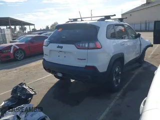 2019 Jeep Cherokee Trailhawk Elite with VIN 1C4PJMBX7KD410612, listed as a IAAI auction lot 41878935 with 55,163 mi miles. Bid and sale history available at carsss.com. Image 4.