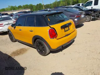 2016 MINI Hardtop 4 Door with VIN WMWXU1C58G2D08712, listed as a IAAI auction lot 42038278 with 96,874 mi miles and . Bid and sale history available at DreamBid. Image 3.