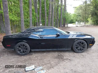 2013 Dodge Challenger SXT z VIN 2C3CDYAG2DH632743, wystawiony jako IAAI lot #42201981 z przebiegiem 154 018 mil mil oraz . Historia ofert i sprzedaży dostępna na DreamBid. Obrazek 14.
