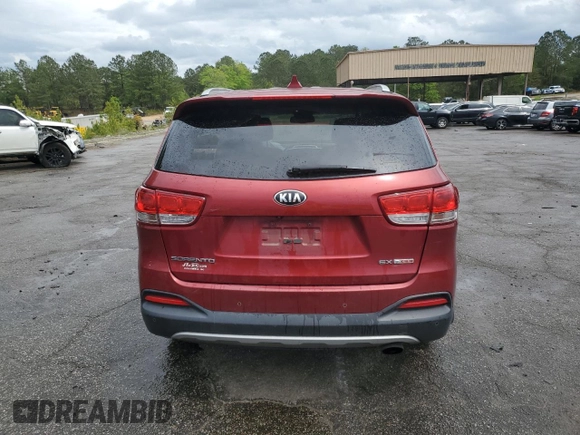 2016 Kia Sorento EX with VIN 5XYPH4A17GG028369, listed as a Copart auction lot 52107365 with 216,039 mi miles and Salvage title. Bid and sale history available at DreamBid. Image 6.
