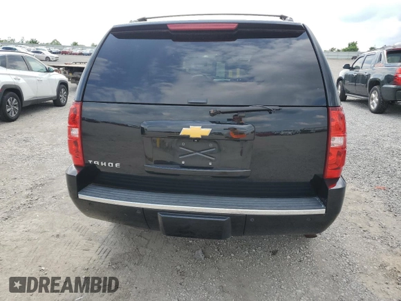 2014 Chevrolet Tahoe LTZ with VIN 1GNSKCE0XER228028, listed as a Copart auction lot 56971135 with 155,285 mi miles and Salvage title. Bid and sale history available at DreamBid. Image 6.