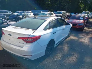 2015 Hyundai Sonata 2.0T Sport with VIN 5NPE34AB5FH166644, listed as a IAAI auction lot 40066764 with 113,887 mi miles. Bid and sale history available at carsss.com. Image 4.
