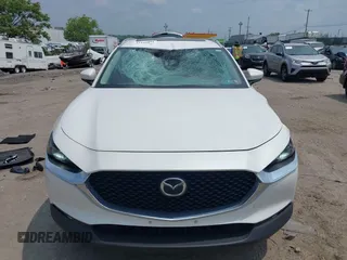2021 Mazda CX-30 Premium with VIN 3MVDMBDL0MM307045, listed as a IAAI auction lot 42446494 with 33,112 mi miles and . Bid and sale history available at DreamBid. Image 13.
